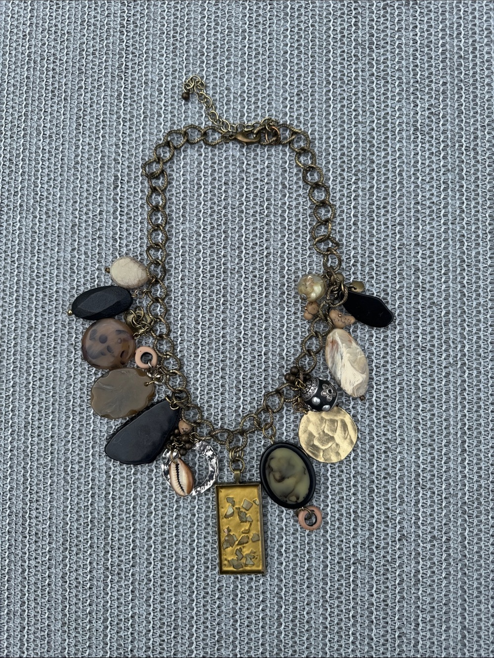 Layered Charm Necklace in Gold with Black and Neutral Accents